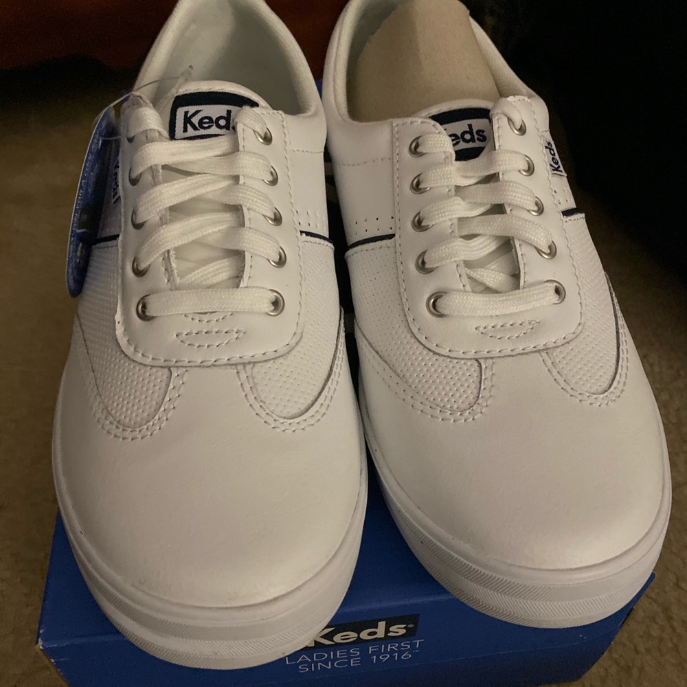 Women’s white leather Keds